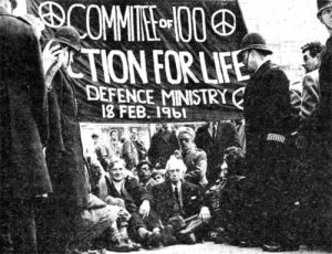 Bertrand Russell (centre) leads the first sit-down